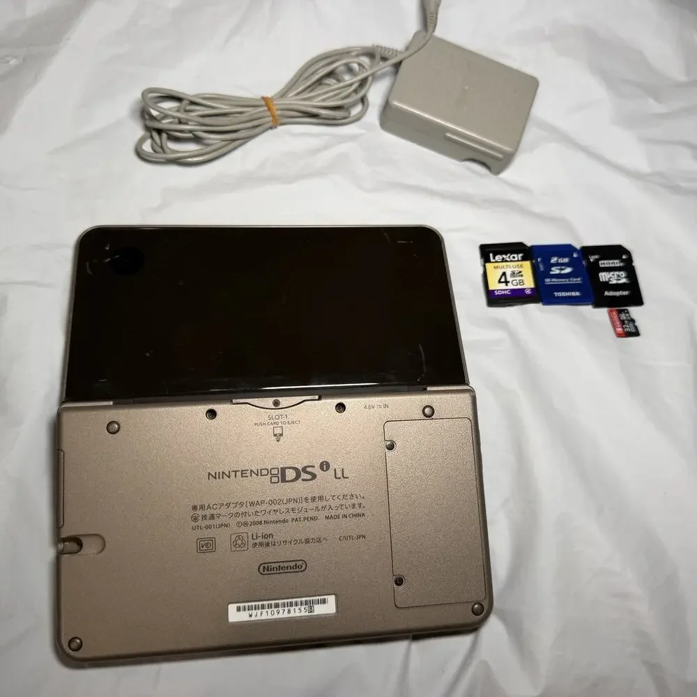 Nintendo DSi LL Bronze/Dark Brown Japanese Version Plays US Games RD DESCRIPTION